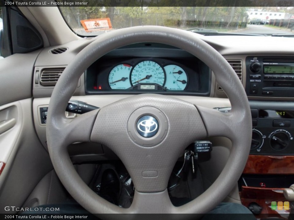 Pebble Beige Interior Steering Wheel for the 2004 Toyota Corolla LE #99164925