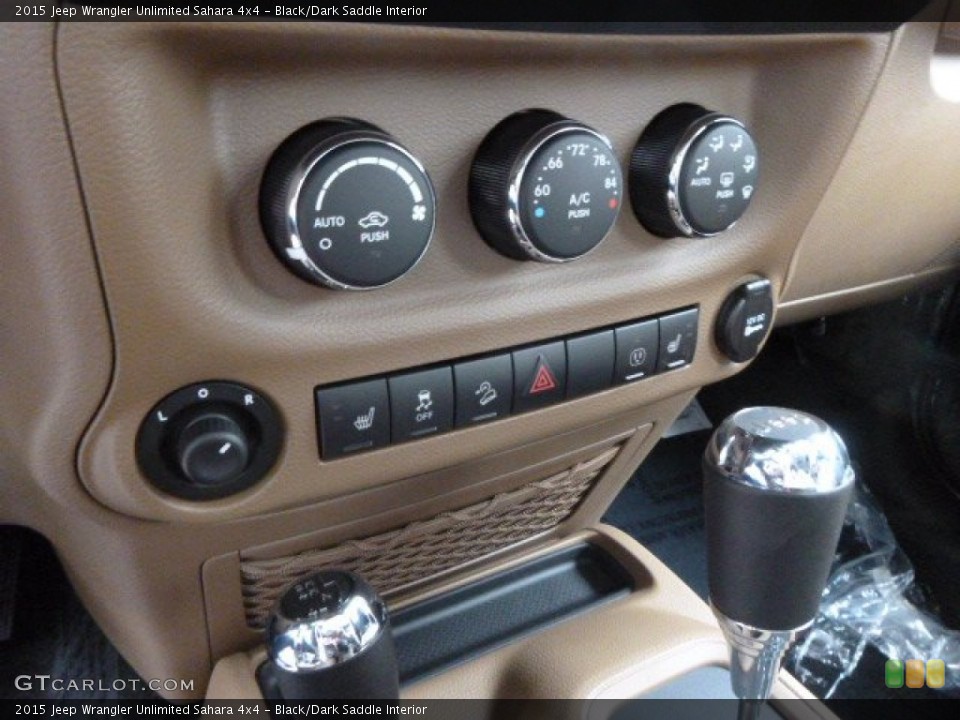 Black/Dark Saddle Interior Controls for the 2015 Jeep Wrangler Unlimited Sahara 4x4 #99270082