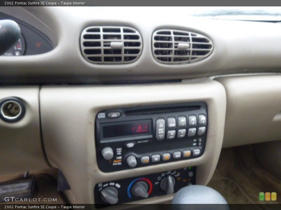 Taupe Interior Controls for the 2002 Pontiac Sunfire SE Coupe #99328312