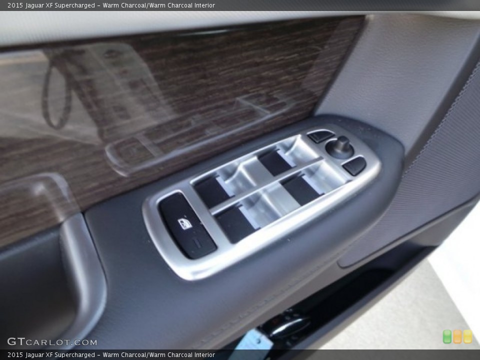 Warm Charcoal/Warm Charcoal Interior Controls for the 2015 Jaguar XF Supercharged #99587452