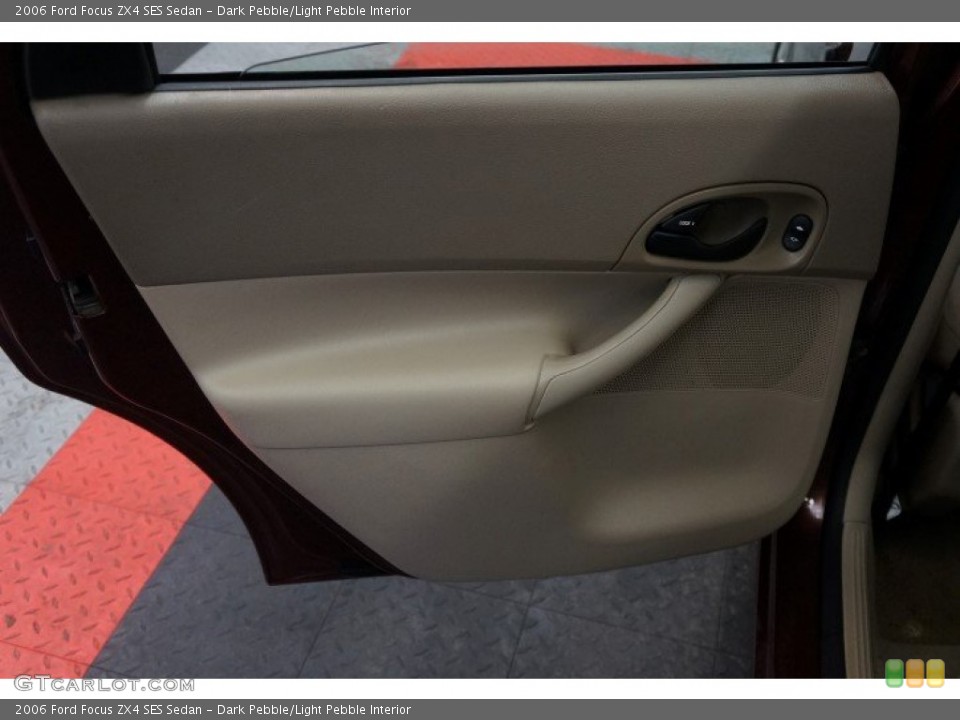 Dark Pebble/Light Pebble Interior Door Panel for the 2006 Ford Focus ZX4 SES Sedan #99614337