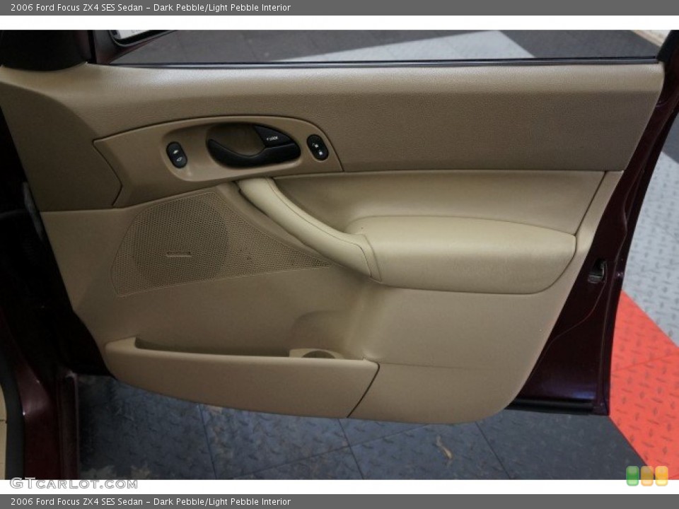 Dark Pebble/Light Pebble Interior Door Panel for the 2006 Ford Focus ZX4 SES Sedan #99614380
