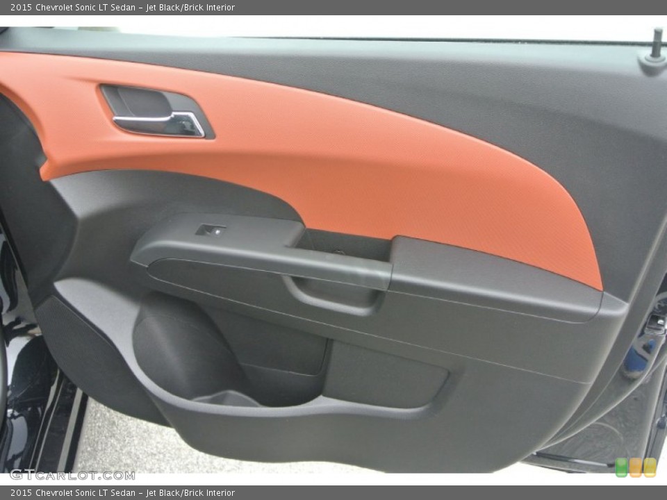 Jet Black/Brick Interior Door Panel for the 2015 Chevrolet Sonic LT Sedan #99615546