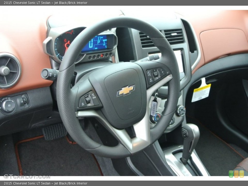 Jet Black/Brick Interior Steering Wheel for the 2015 Chevrolet Sonic LT Sedan #99615624