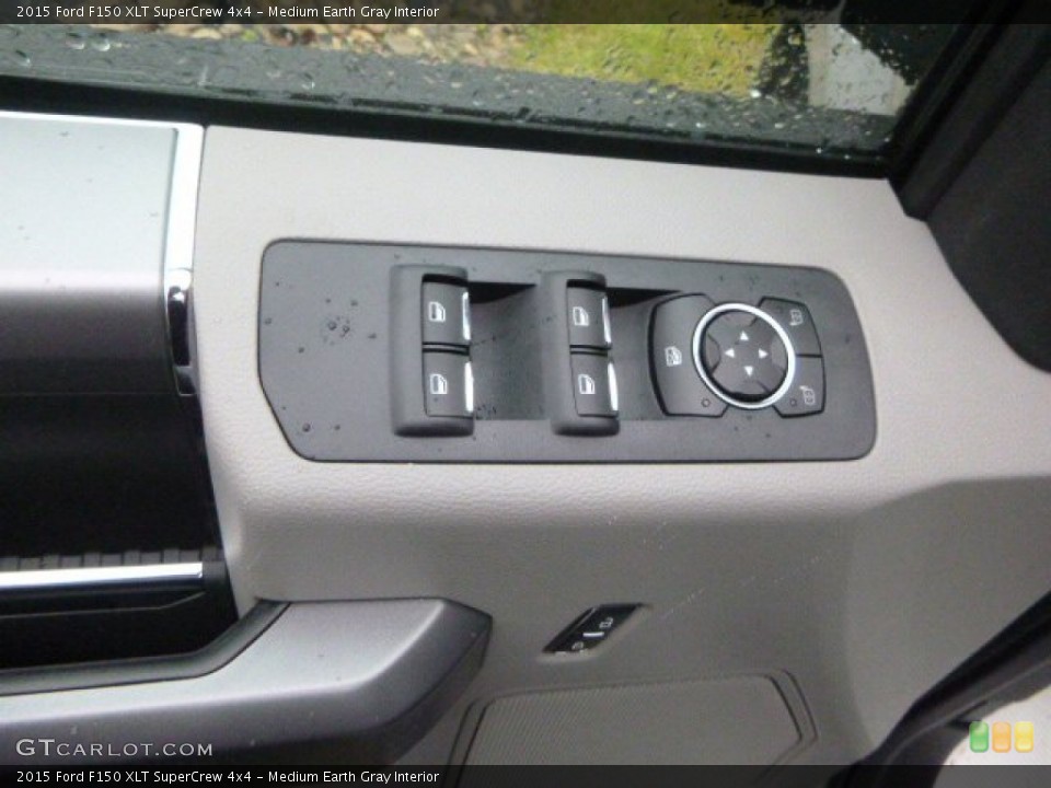Medium Earth Gray Interior Controls for the 2015 Ford F150 XLT SuperCrew 4x4 #99720370