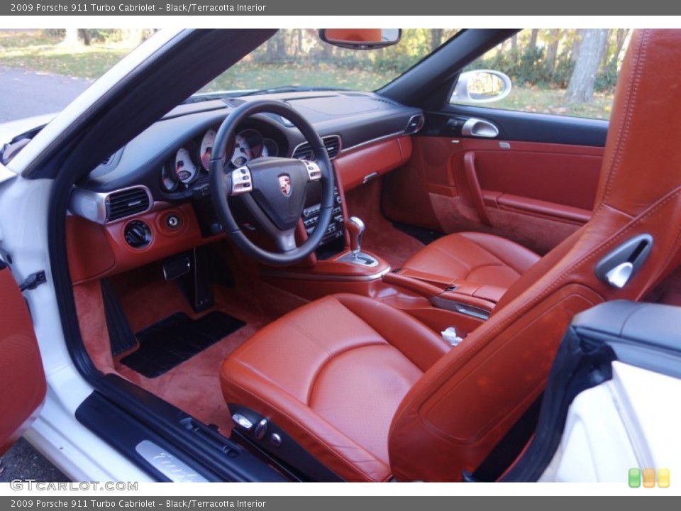 Black/Terracotta Interior Prime Interior for the 2009 Porsche 911 Turbo Cabriolet #99752835
