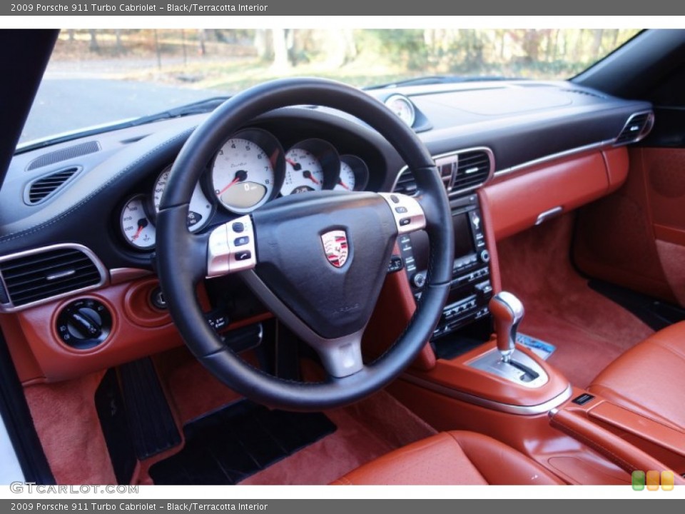 Black/Terracotta Interior Dashboard for the 2009 Porsche 911 Turbo Cabriolet #99752973