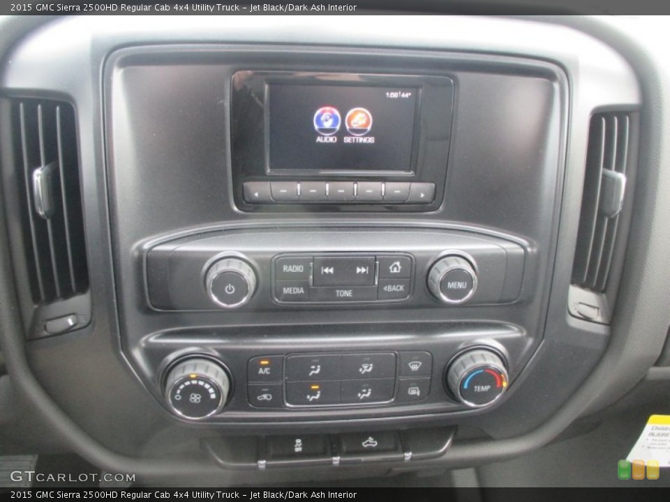 Jet Black/Dark Ash Interior Controls for the 2015 GMC Sierra 2500HD Regular Cab 4x4 Utility Truck #99759966