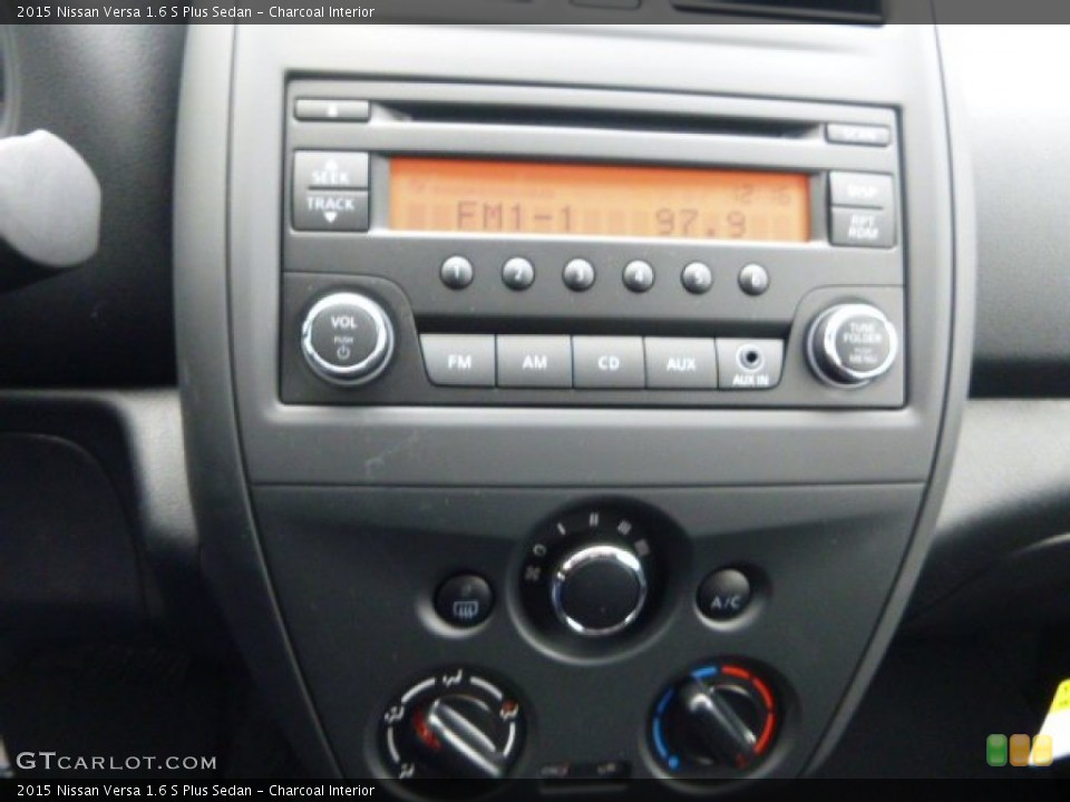 Charcoal Interior Controls for the 2015 Nissan Versa 1.6 S Plus Sedan #99914572