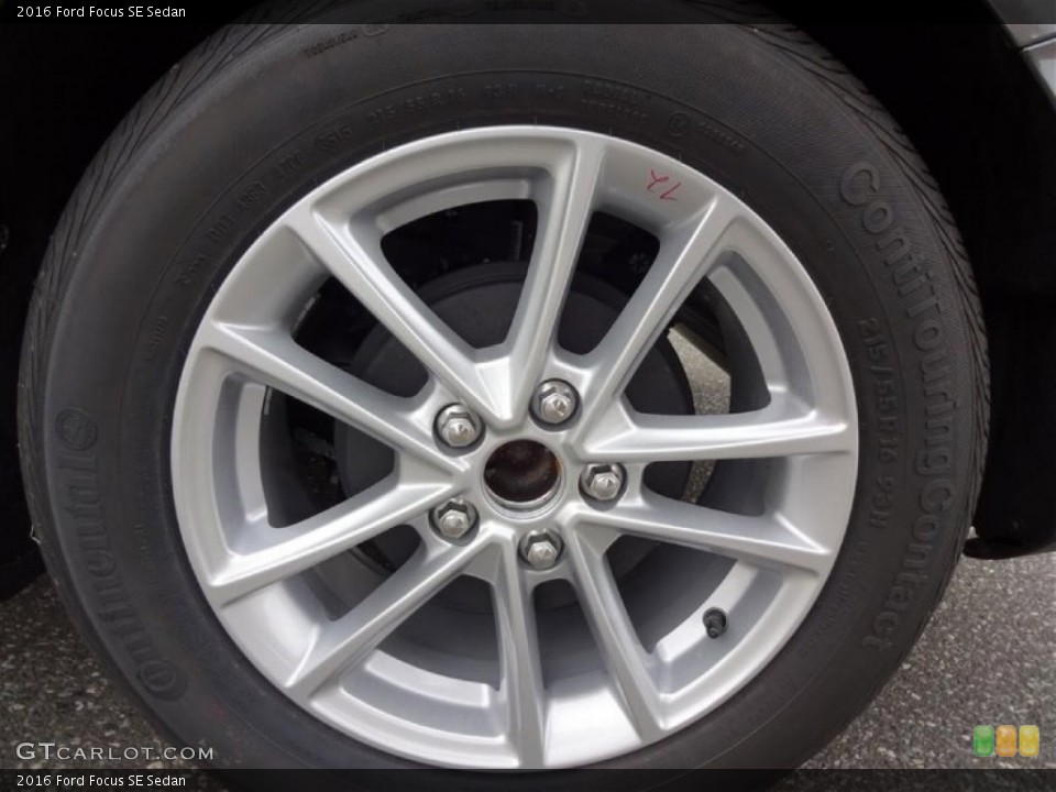2016 Ford Focus SE Sedan Wheel and Tire Photo #108203977