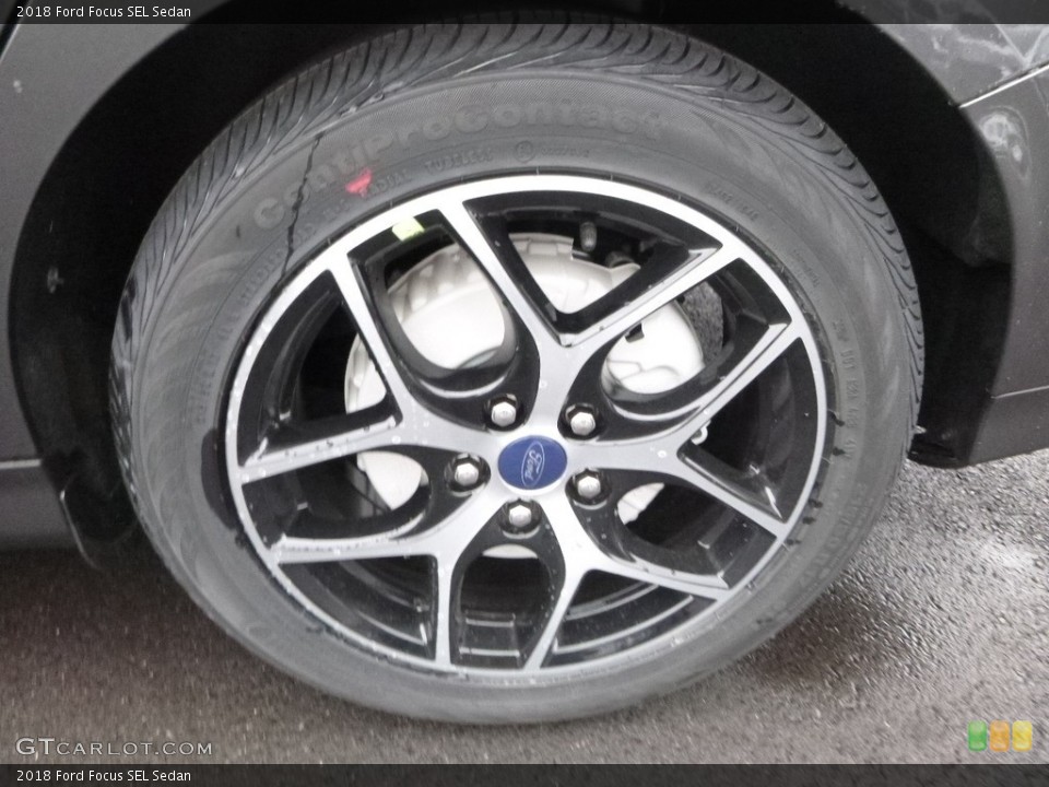2018 Ford Focus SEL Sedan Wheel and Tire Photo #124043605