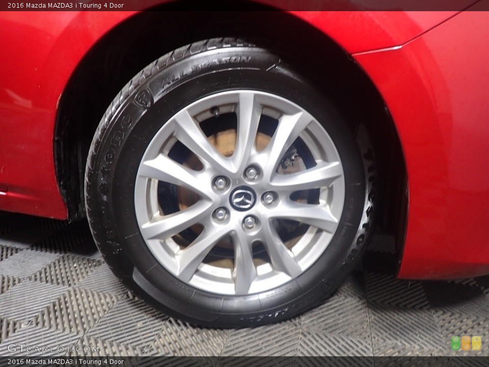2016 Mazda MAZDA3 i Touring 4 Door Wheel and Tire Photo #141275070