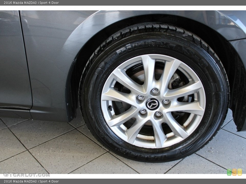 2016 Mazda MAZDA3 i Sport 4 Door Wheel and Tire Photo #145569822