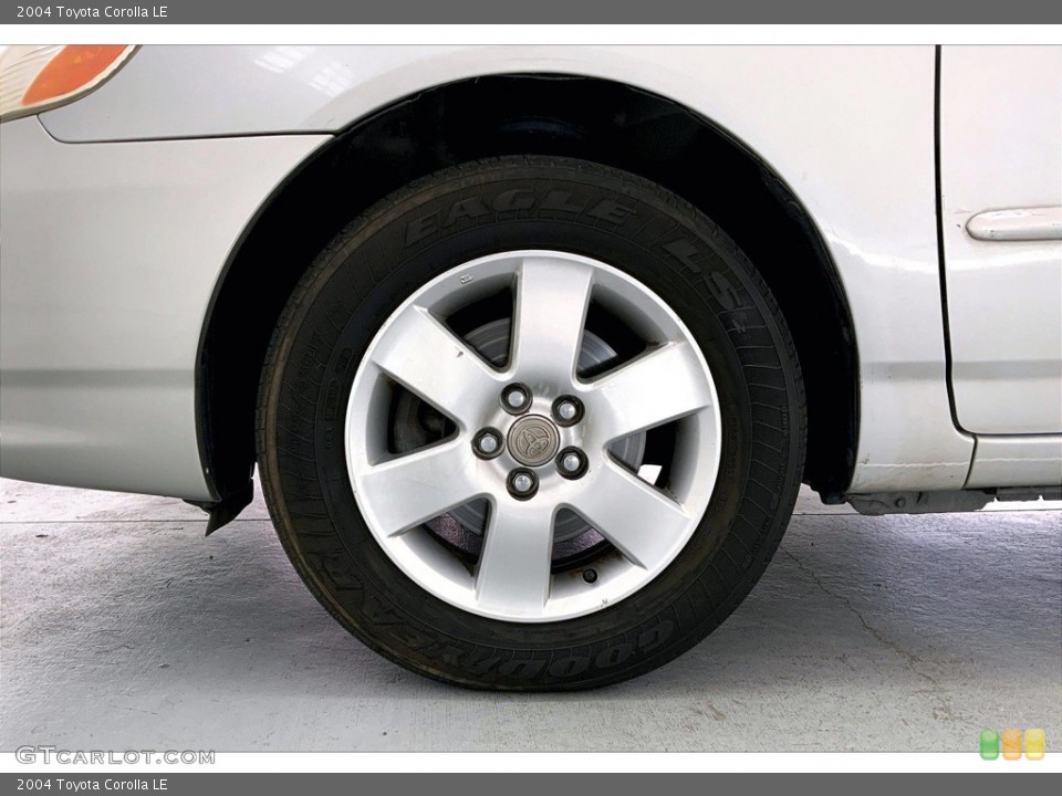 2004 Toyota Corolla LE Wheel and Tire Photo #145630658