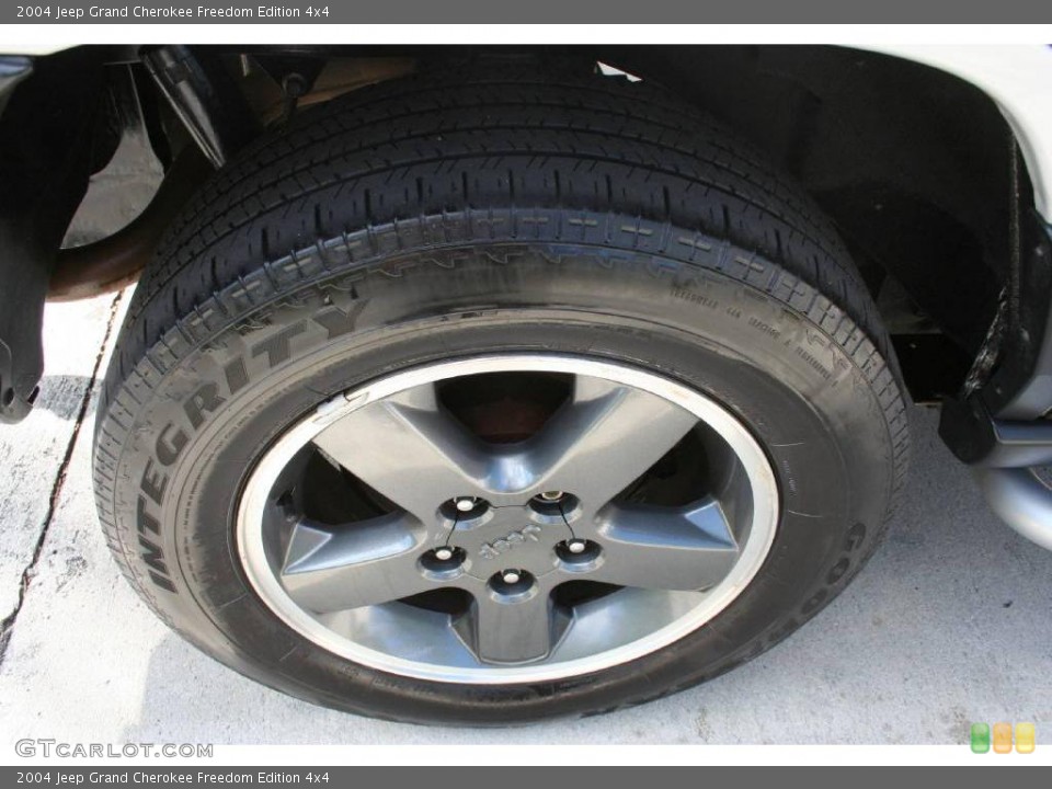 2004 Jeep Grand Cherokee Freedom Edition 4x4 Wheel and Tire Photo #22664933