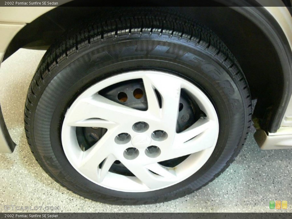 2002 Pontiac Sunfire SE Sedan Wheel and Tire Photo #23671220