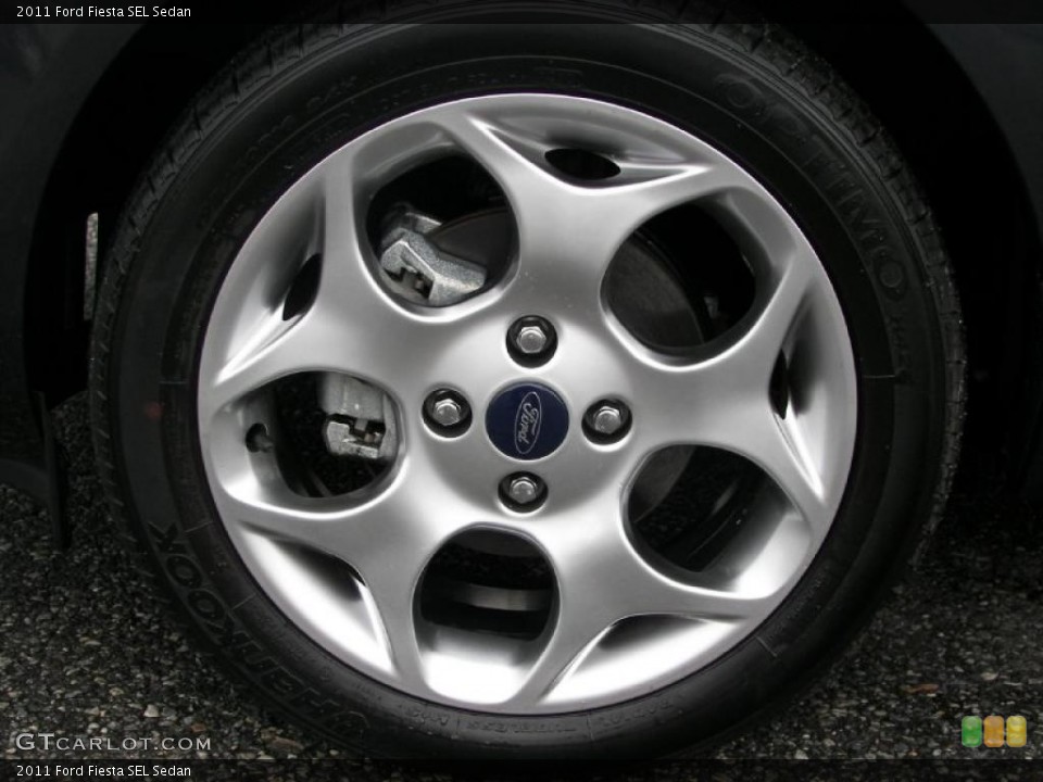 2011 Ford Fiesta SEL Sedan Wheel and Tire Photo #37483245