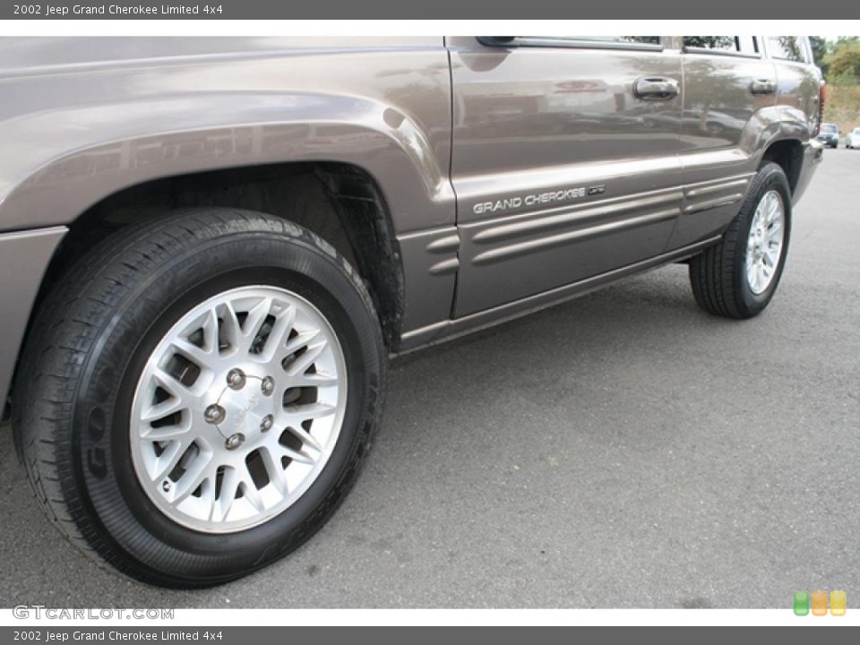 2002 Jeep Grand Cherokee Limited 4x4 Wheel and Tire Photo #37849379