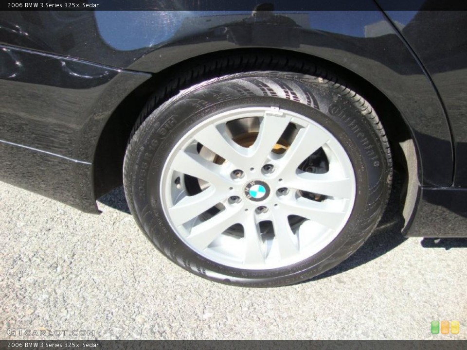 How to change a tire on a bmw 325xi #4