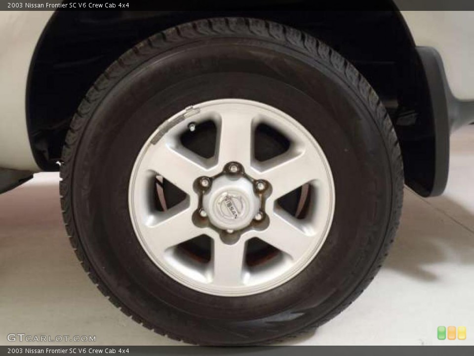 2003 Nissan Frontier SC V6 Crew Cab 4x4 Wheel and Tire Photo #38343093