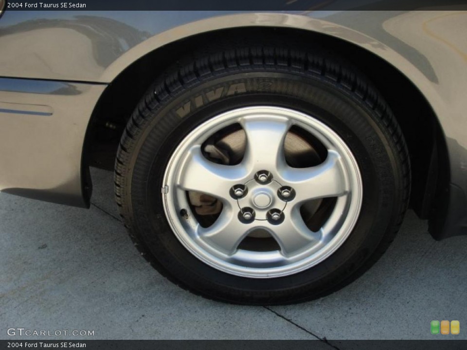 2004 Ford Taurus SE Sedan Wheel and Tire Photo #38881329