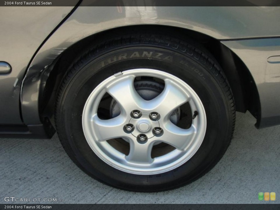 2004 Ford Taurus SE Sedan Wheel and Tire Photo #38881345