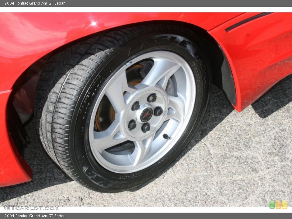 2004 Pontiac Grand Am GT Sedan Wheel and Tire Photo #38907538