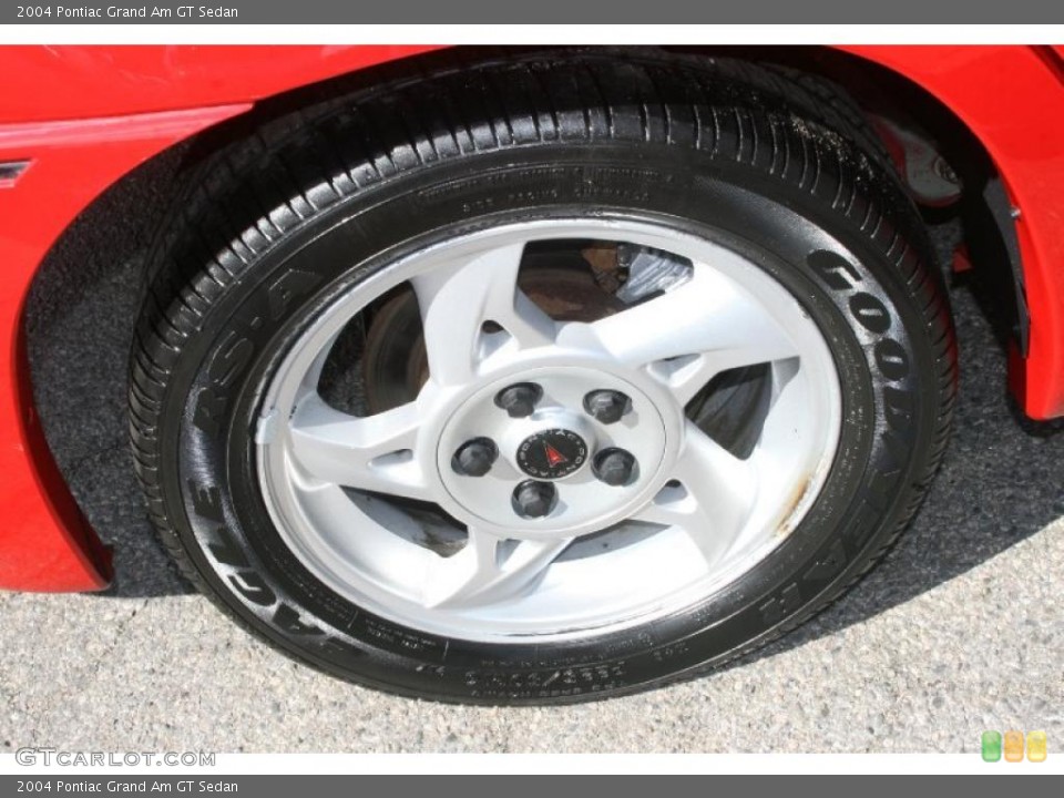 2004 Pontiac Grand Am GT Sedan Wheel and Tire Photo #38907554