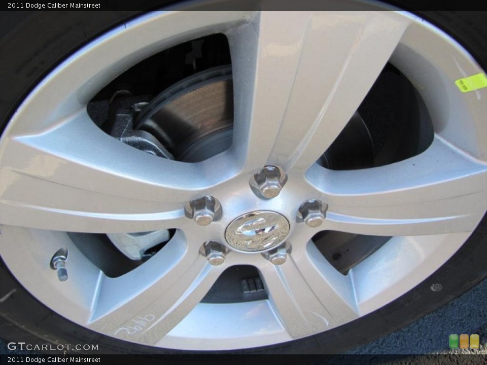 2011 Dodge Caliber Mainstreet Wheel and Tire Photo #38970526
