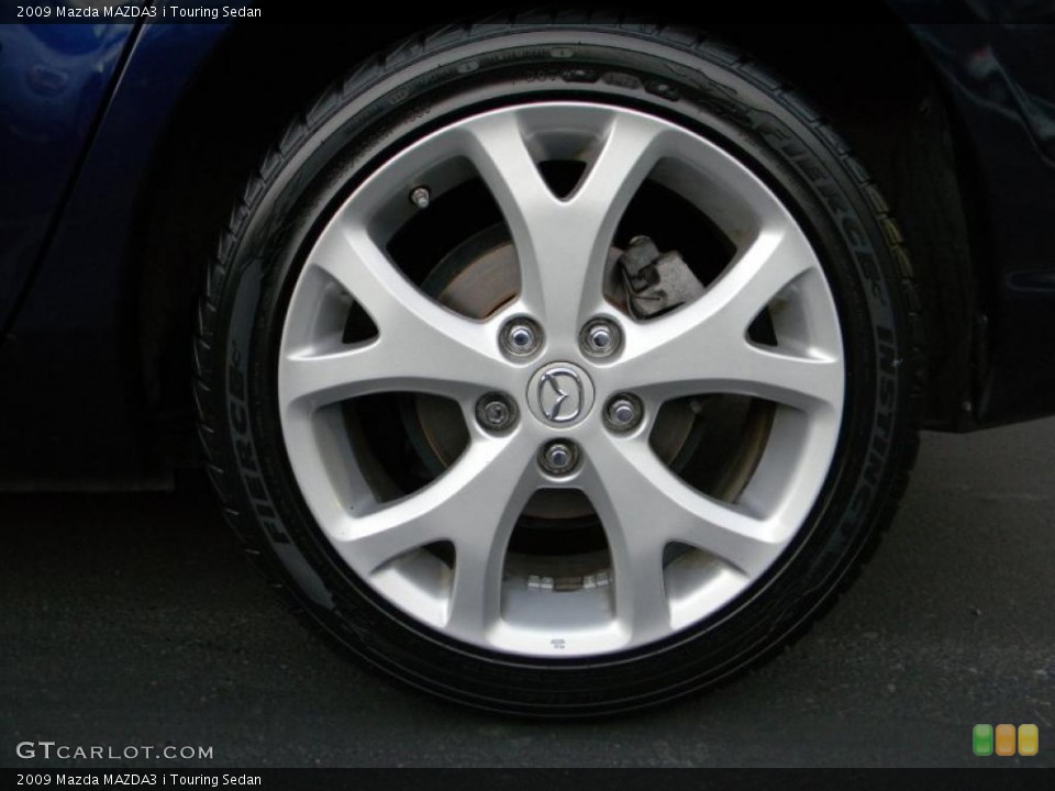 2009 Mazda MAZDA3 i Touring Sedan Wheel and Tire Photo #39100026
