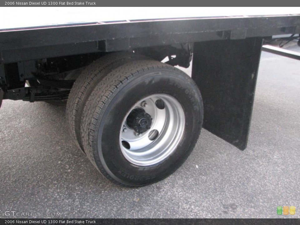 2006 Nissan Diesel UD 1300 Flat Bed Stake Truck Wheel and Tire Photo #39764462