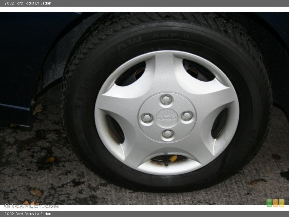 2002 Ford Focus LX Sedan Wheel and Tire Photo #40187395