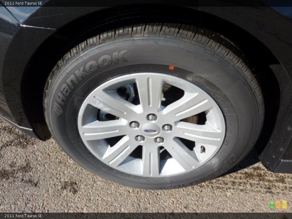 2011 Ford Taurus SE Wheel and Tire Photo #40596141