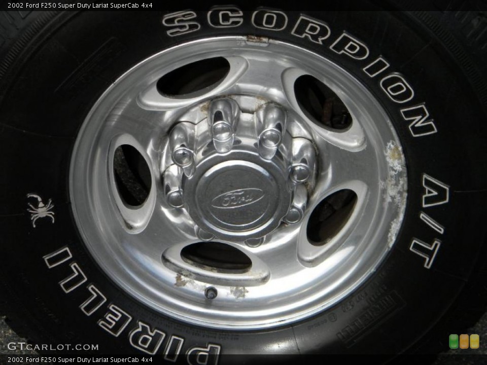 2002 Ford F250 Super Duty Lariat SuperCab 4x4 Wheel and Tire Photo #40652175
