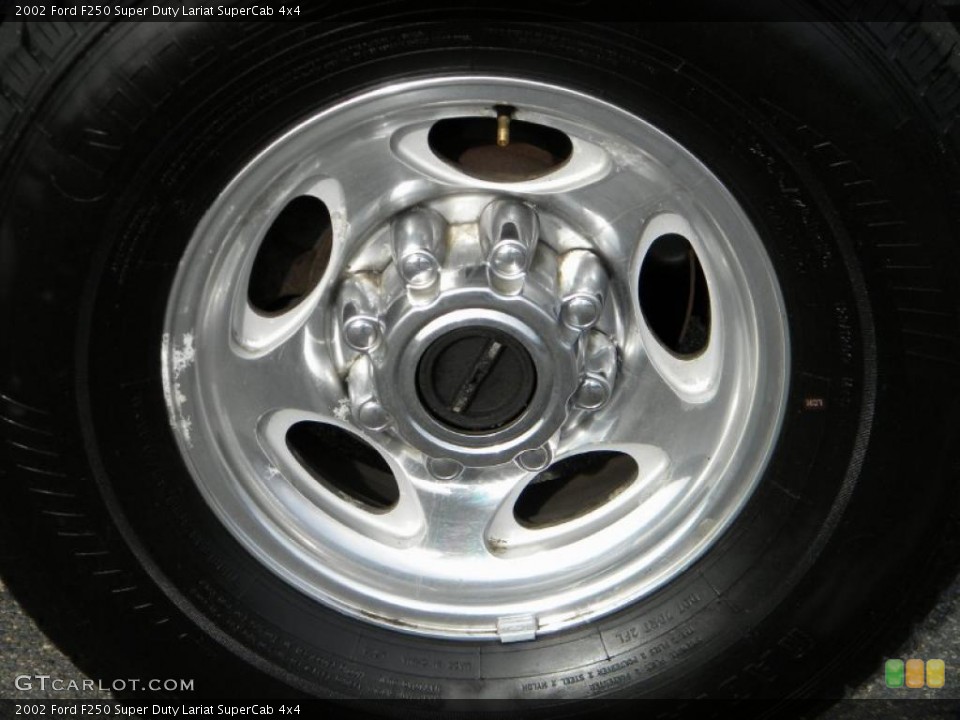 2002 Ford F250 Super Duty Lariat SuperCab 4x4 Wheel and Tire Photo #40652195