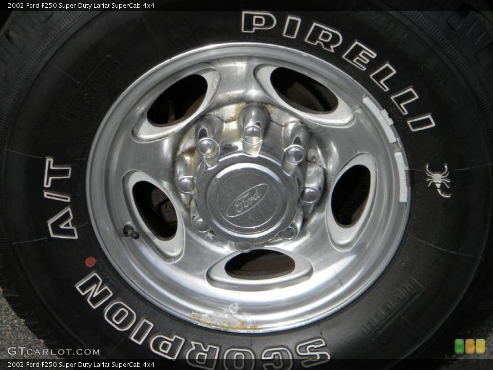 2002 Ford F250 Super Duty Lariat SuperCab 4x4 Wheel and Tire Photo #40652215