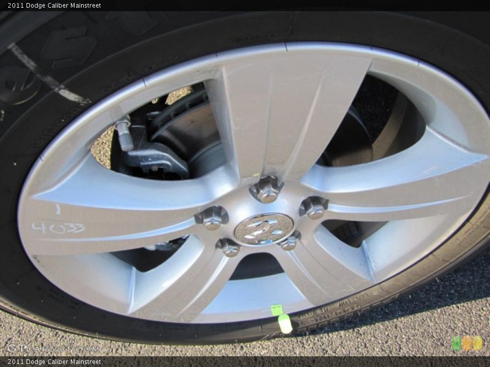 2011 Dodge Caliber Mainstreet Wheel and Tire Photo #41142115