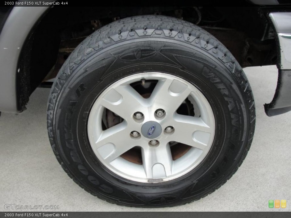 2003 Ford F150 XLT SuperCab 4x4 Wheel and Tire Photo #41611784