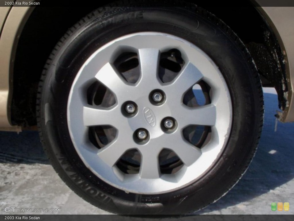 2003 Kia Rio Sedan Wheel and Tire Photo #41709126