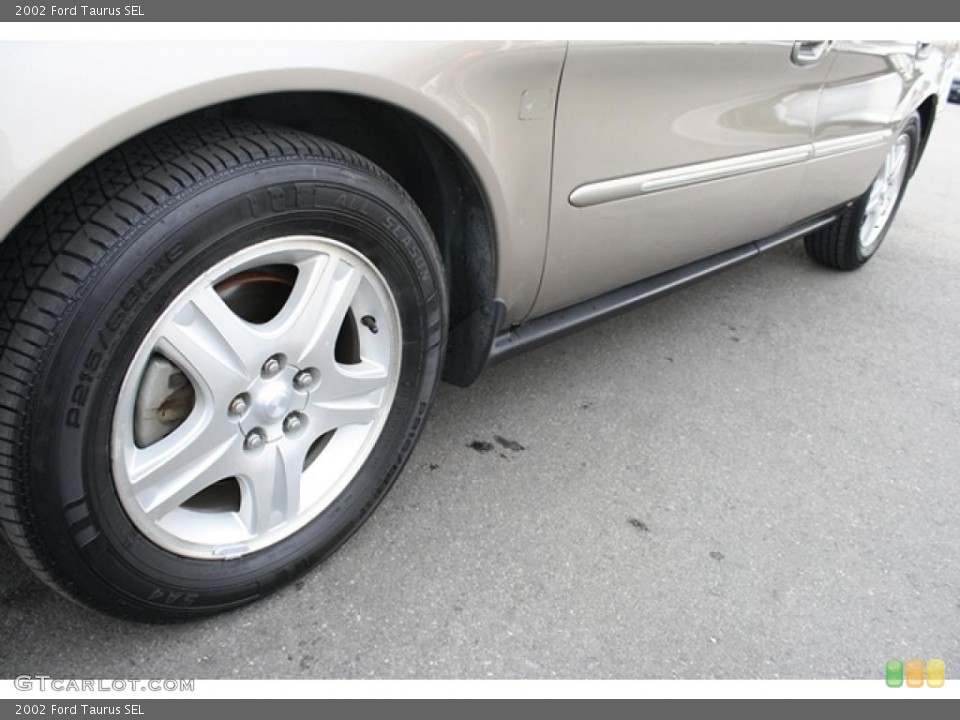 2002 Ford Taurus SEL Wheel and Tire Photo #41887879