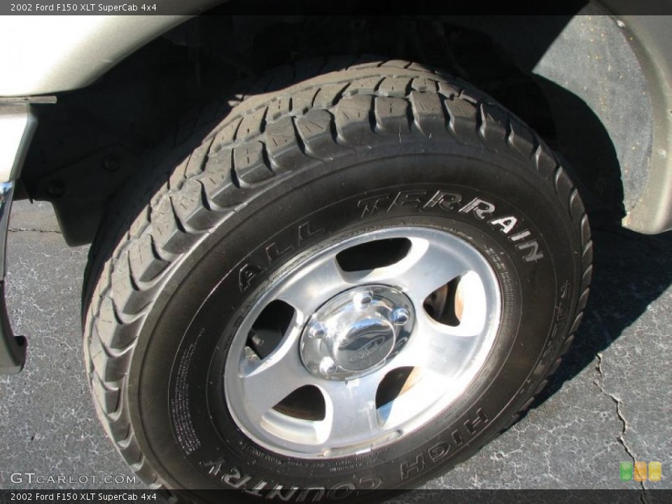2002 Ford F150 XLT SuperCab 4x4 Wheel and Tire Photo #41903236