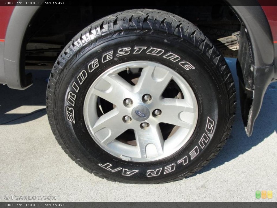 2003 Ford F150 XLT SuperCab 4x4 Wheel and Tire Photo #42076371