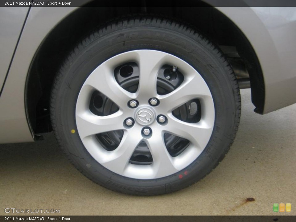 2011 Mazda MAZDA3 i Sport 4 Door Wheel and Tire Photo #42214576