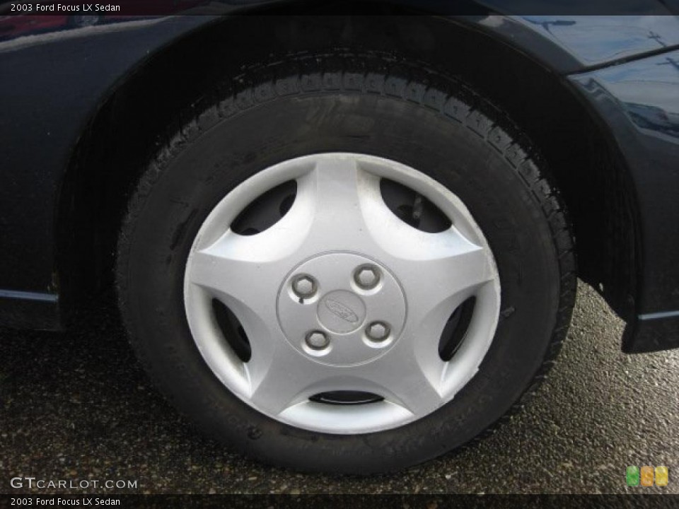 2003 Ford Focus LX Sedan Wheel and Tire Photo #43355651