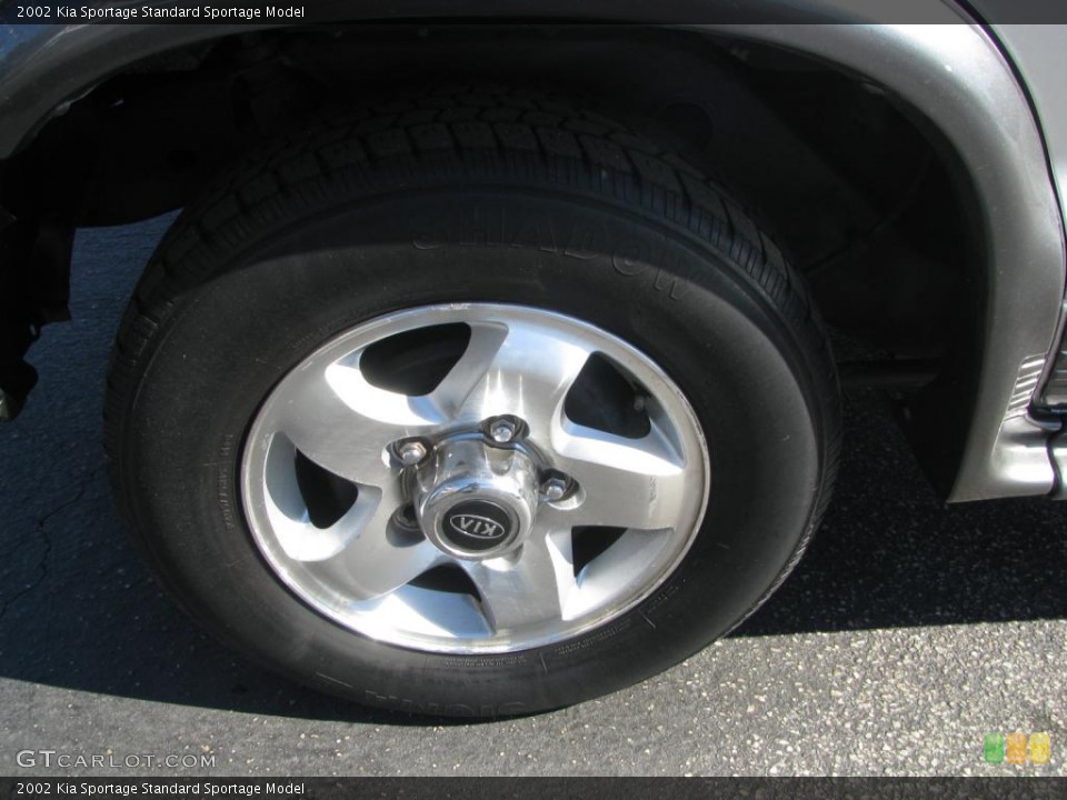 2002 Kia Sportage  Wheel and Tire Photo #44173020