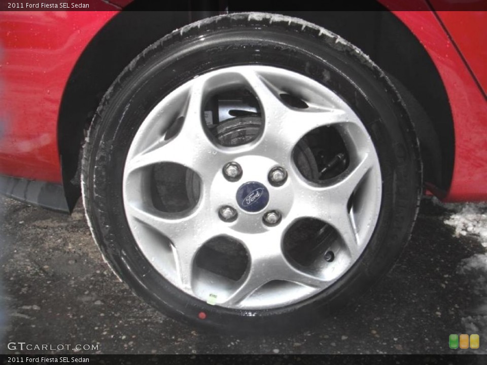 2011 Ford Fiesta SEL Sedan Wheel and Tire Photo #44722313