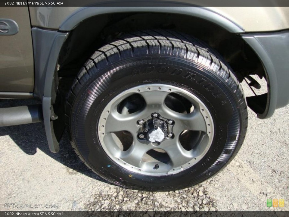 2002 Nissan Xterra SE V6 SC 4x4 Wheel and Tire Photo #45126938