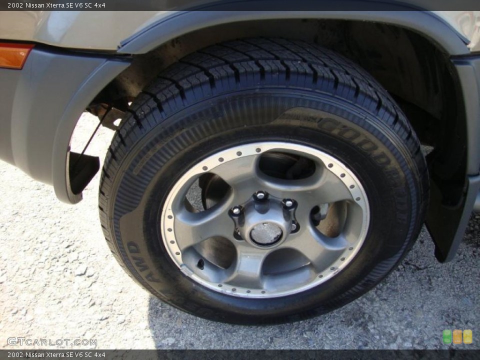 2002 Nissan Xterra SE V6 SC 4x4 Wheel and Tire Photo #45127030