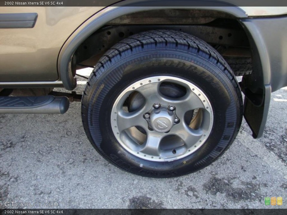 2002 Nissan Xterra SE V6 SC 4x4 Wheel and Tire Photo #45127046