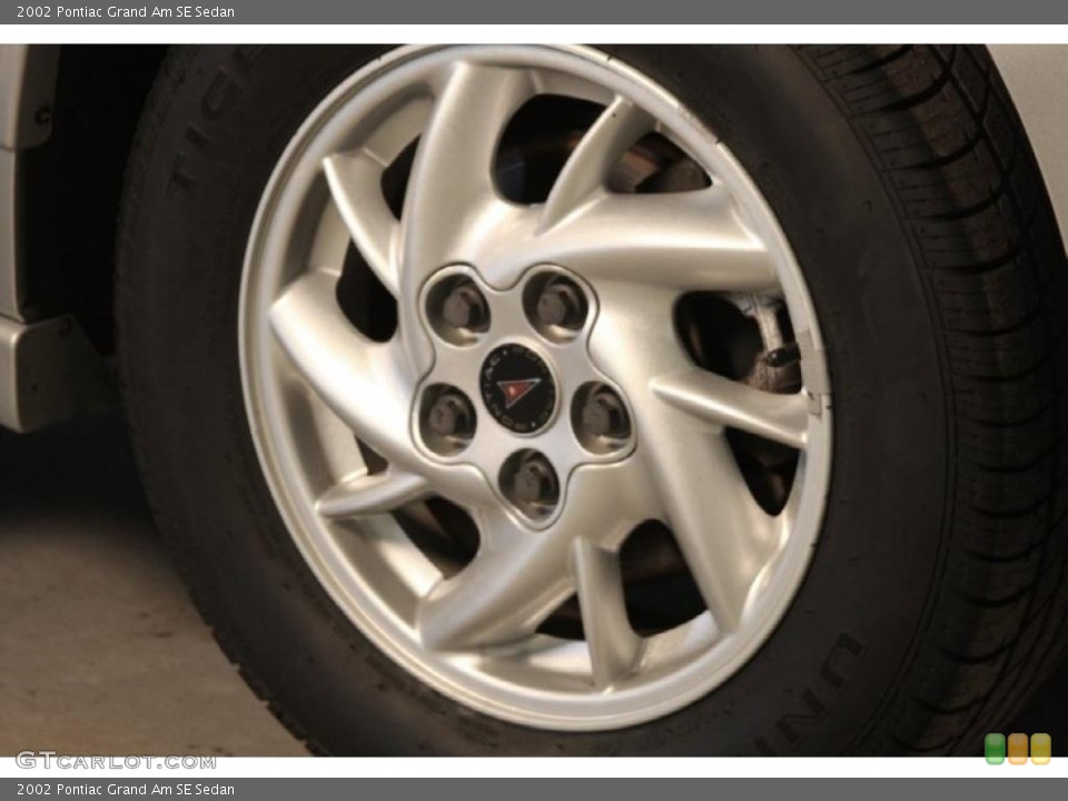 2002 Pontiac Grand Am SE Sedan Wheel and Tire Photo #46076907